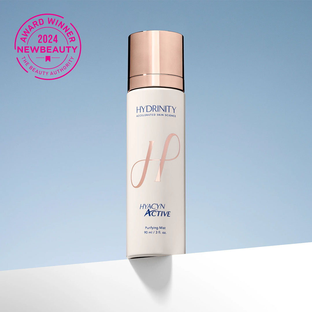 White Hyacyn Active Purifying Mist bottle with rose gold cap and "H" logo, 90ml.