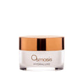 Osmosis Hydraluxe Mask in a clear glass jar with a metallic copper lid.