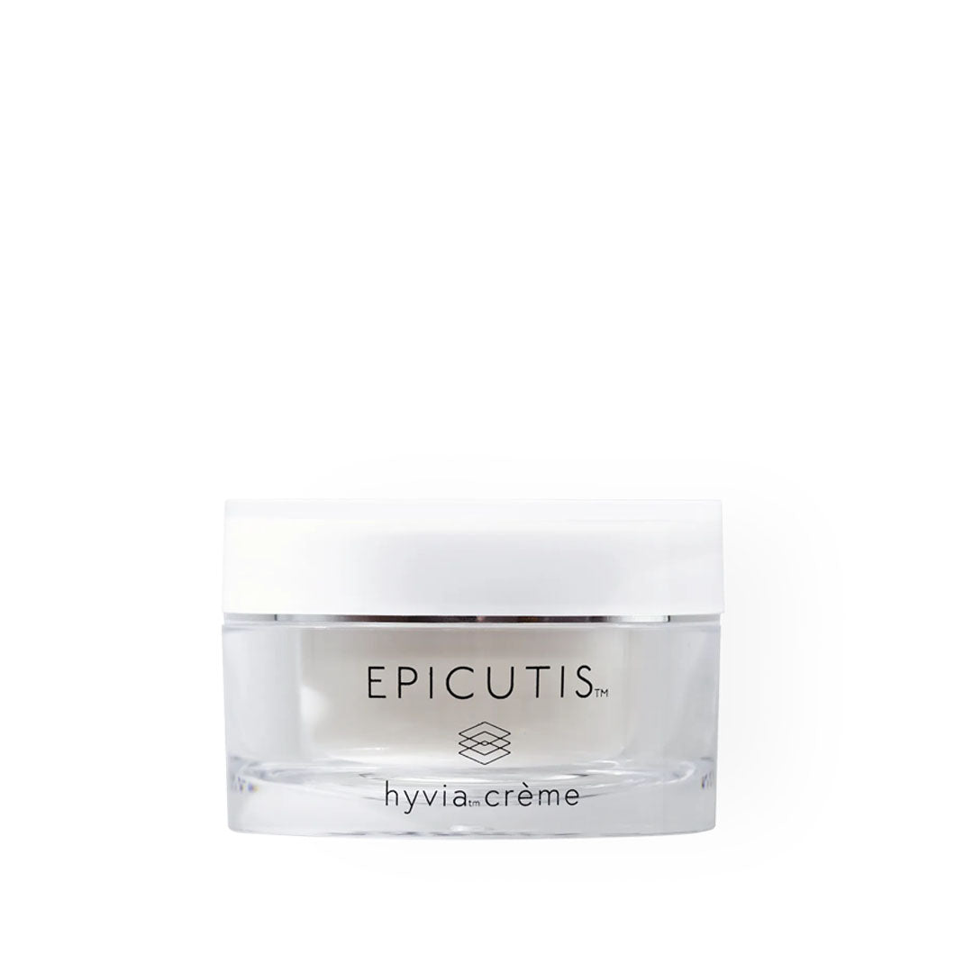 Clear glass jar of Hyvia Crème with a white lid, featuring "EPICUTIS" and "hyvia crème" in black text.