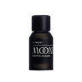 Small, matte black Vitruvi Moonbeam Essential Oil Blend bottle with a matching cap.