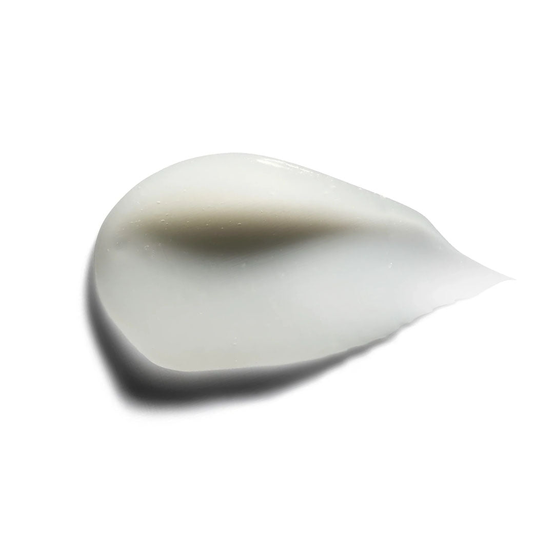 A creamy white swatch of Restorative HA Serum with a soft sheen, isolated on a white background.