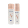 Two white Hydrinity skincare bottles with rose gold caps: HYACYN ACTIVE Purifying Mist and RESTORATIVE HA SERUM.